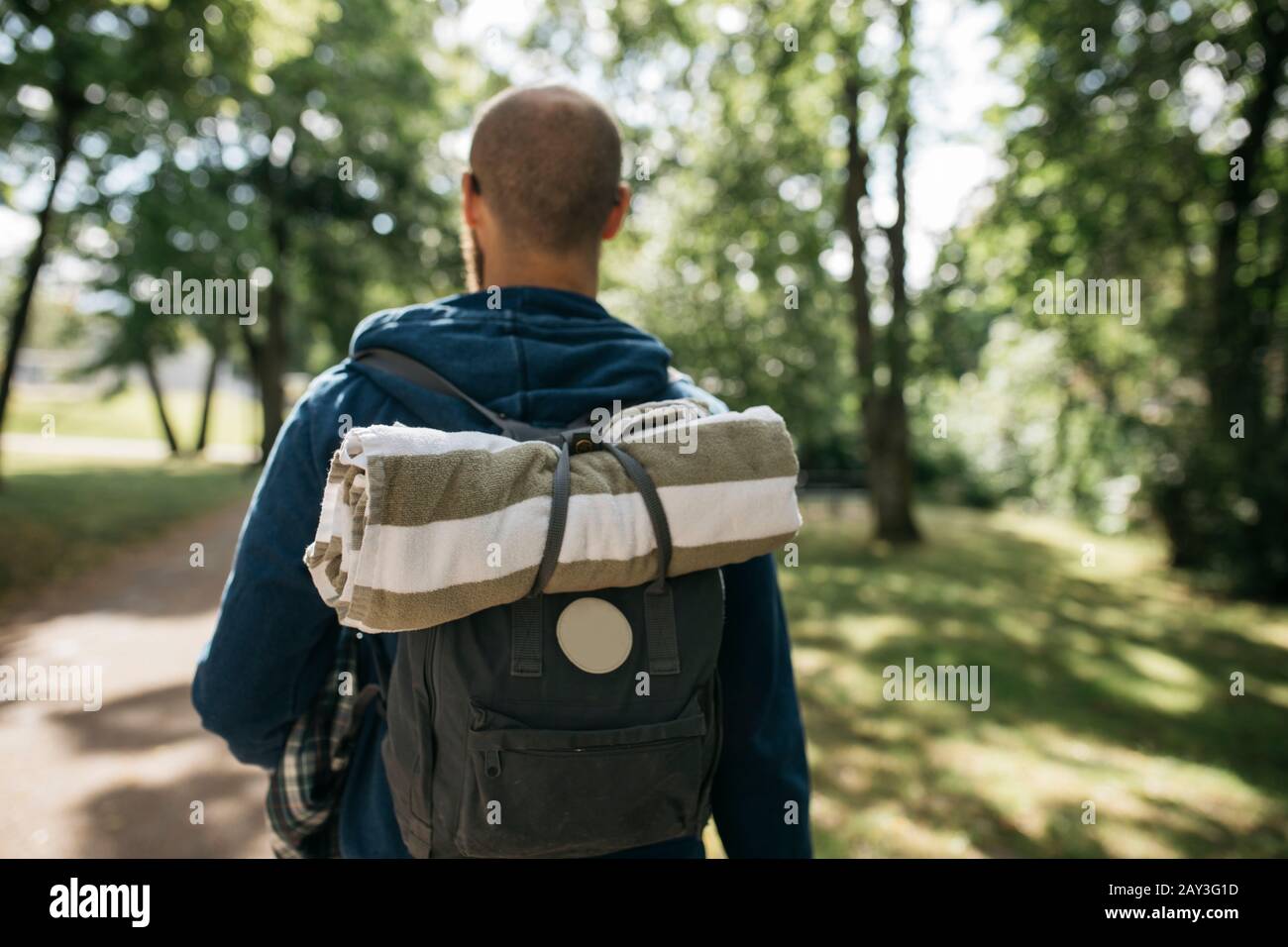 Man carrying rucksack hires stock photography and images Alamy