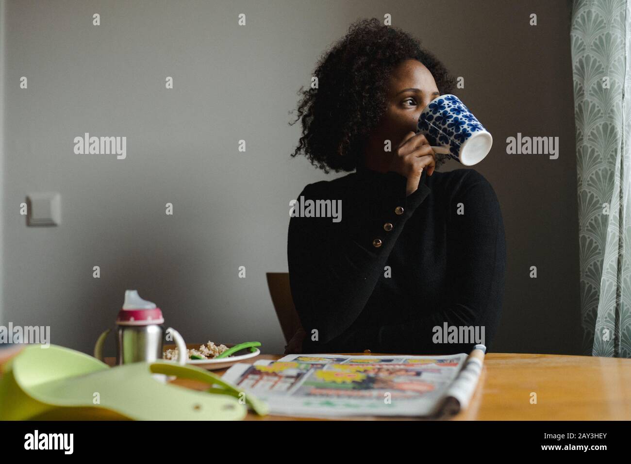 Woman having coffee break Stock Photo