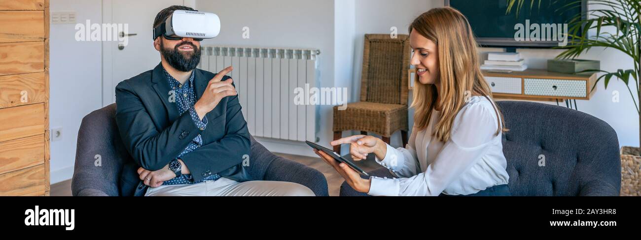 Businessman using virtual reality glasses Stock Photo