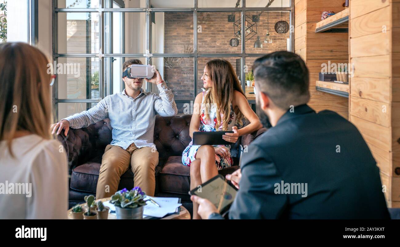 Businessman using virtual reality glasses Stock Photo