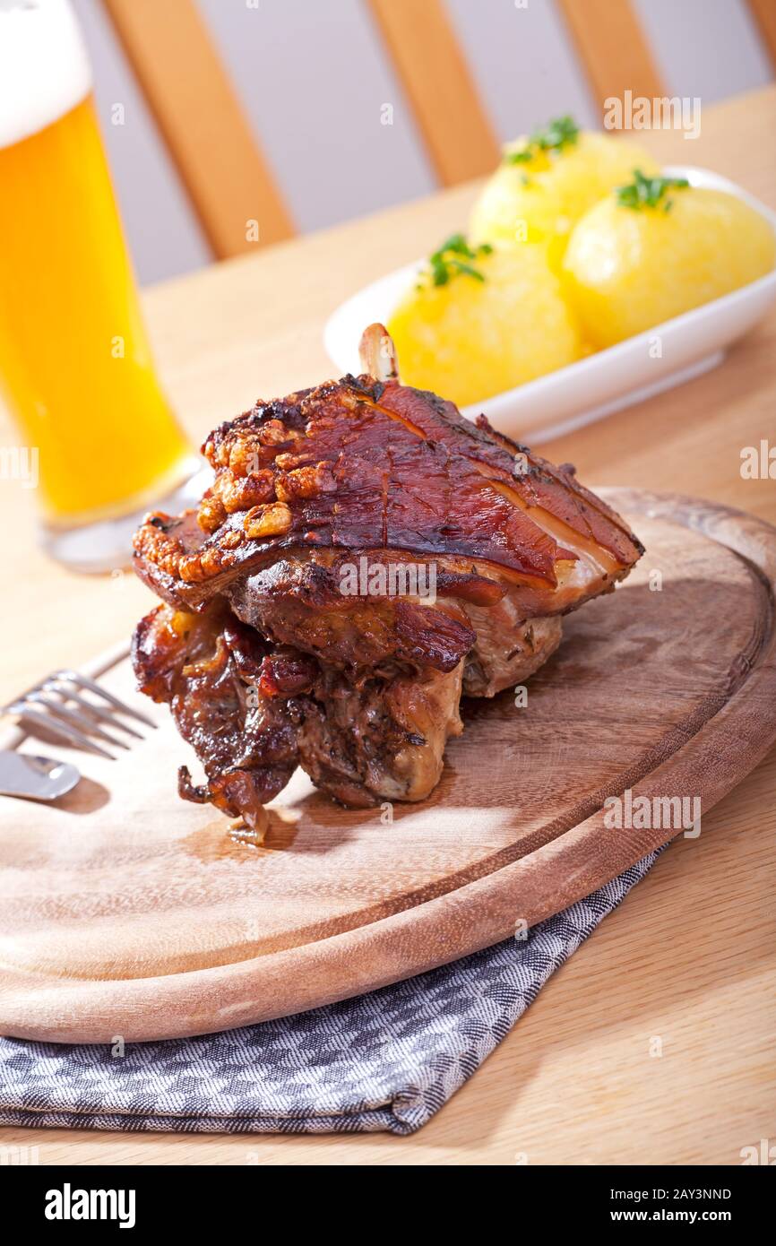 Bavarian knuckle of pork with dumplings Stock Photo Alamy