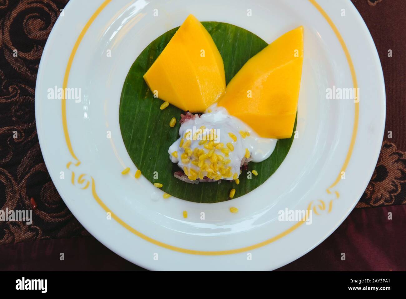 sticky glutinous rice coconut milk & ripe mango. traditional Thai