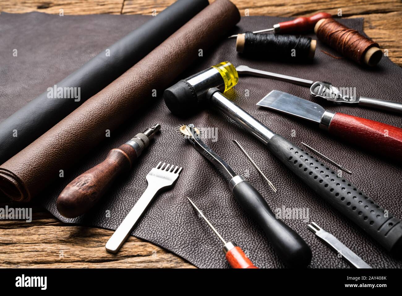 Leather Craft Tools On Desk In Tailoring Workshop Stock Photo