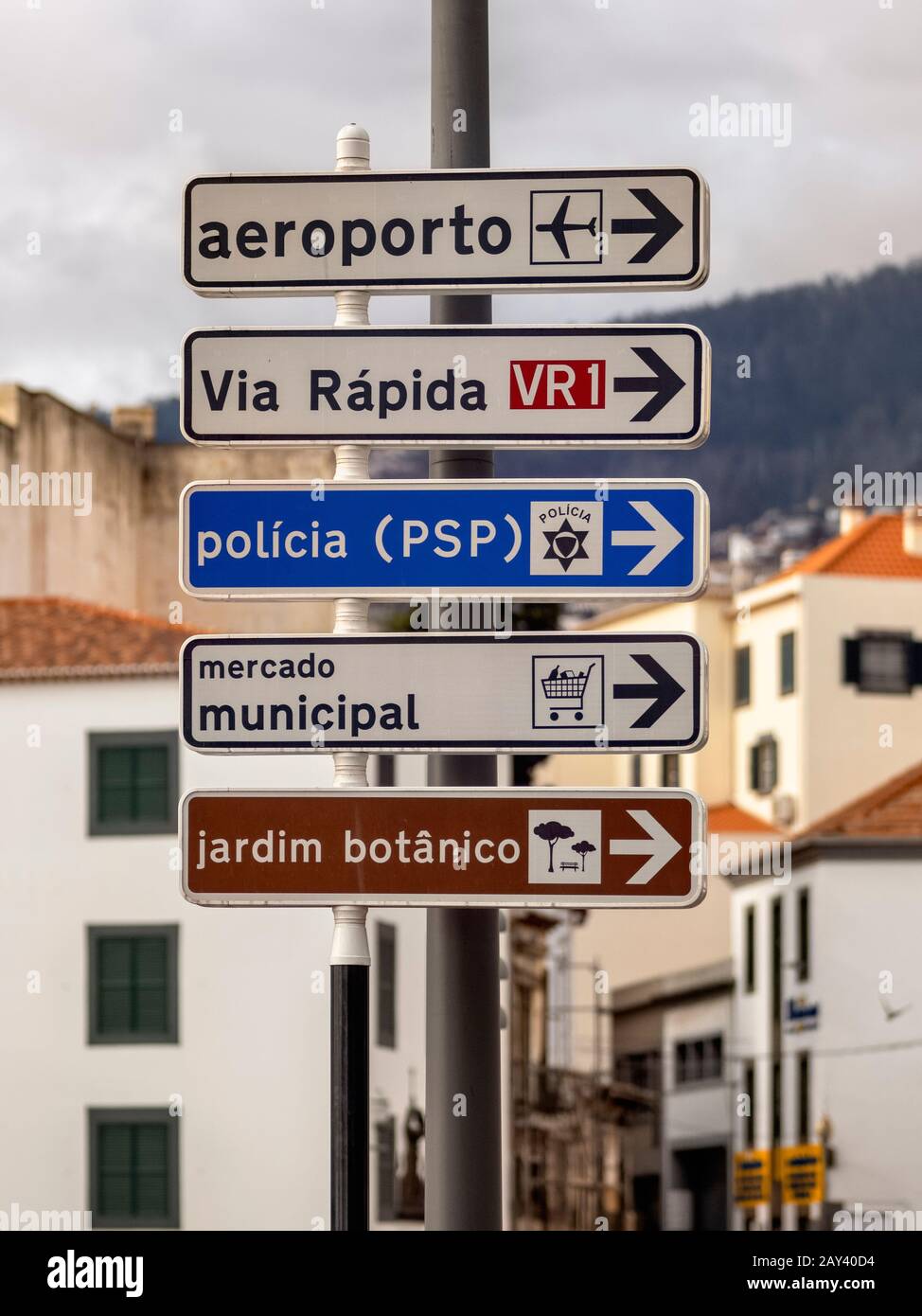 A multiple destination road sign in Funchal, Madeira. Stock Photo