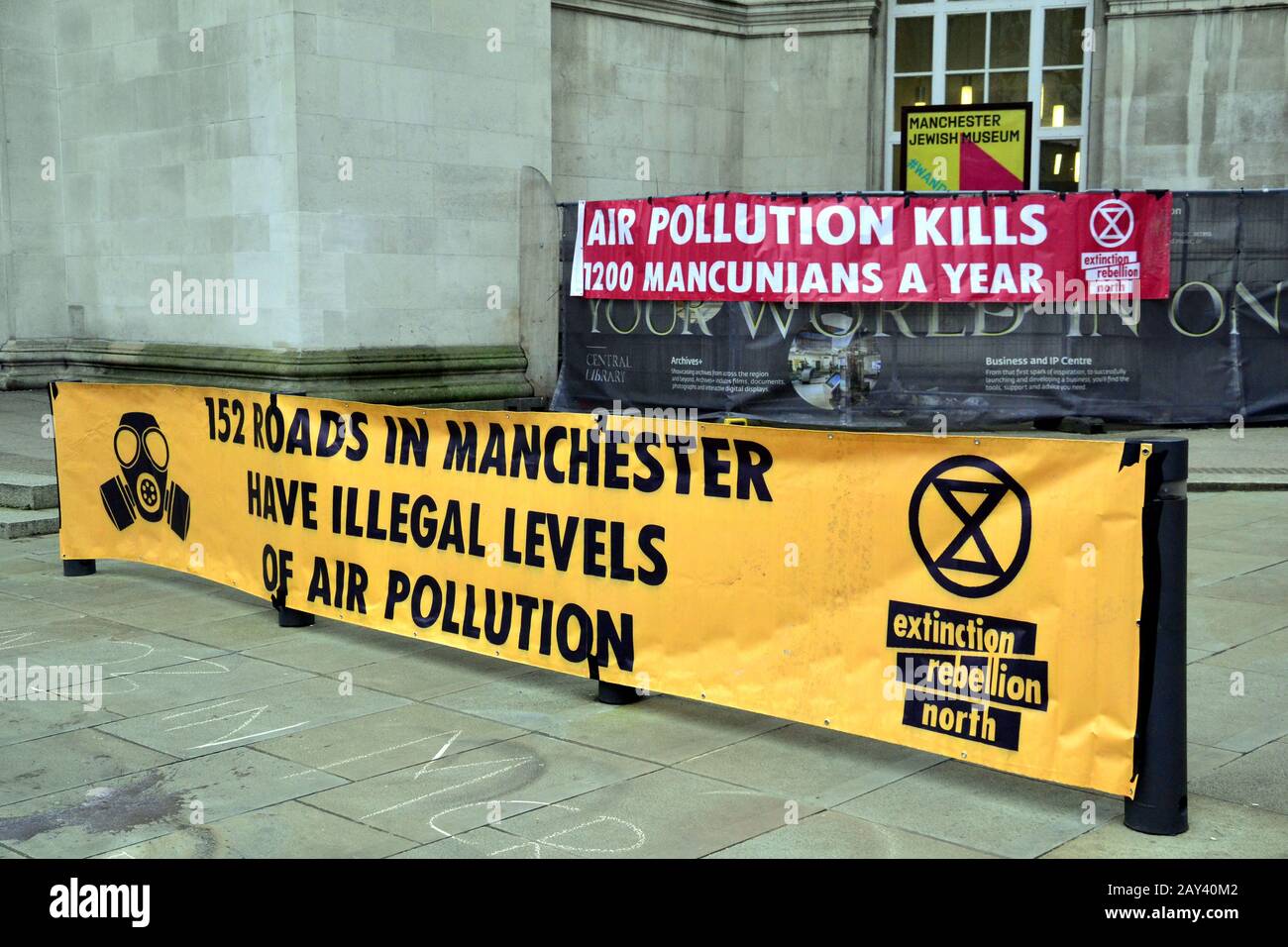 Banners protest about air pollution as young people lobby for action to prevent climate change at the  Manchester Youth Strike 4 Climate protest on 14th February, 2020, in Manchester, uk.  The organisers say: 'Student Climate Network (UKSCN) is a group of mostly under 18s taking to the streets to protest the government’s lack of action on the Climate Crisis. We are mobilising unprecedented numbers of students to create a strong movement and send a message that we are tired of being ignored.' Stock Photo