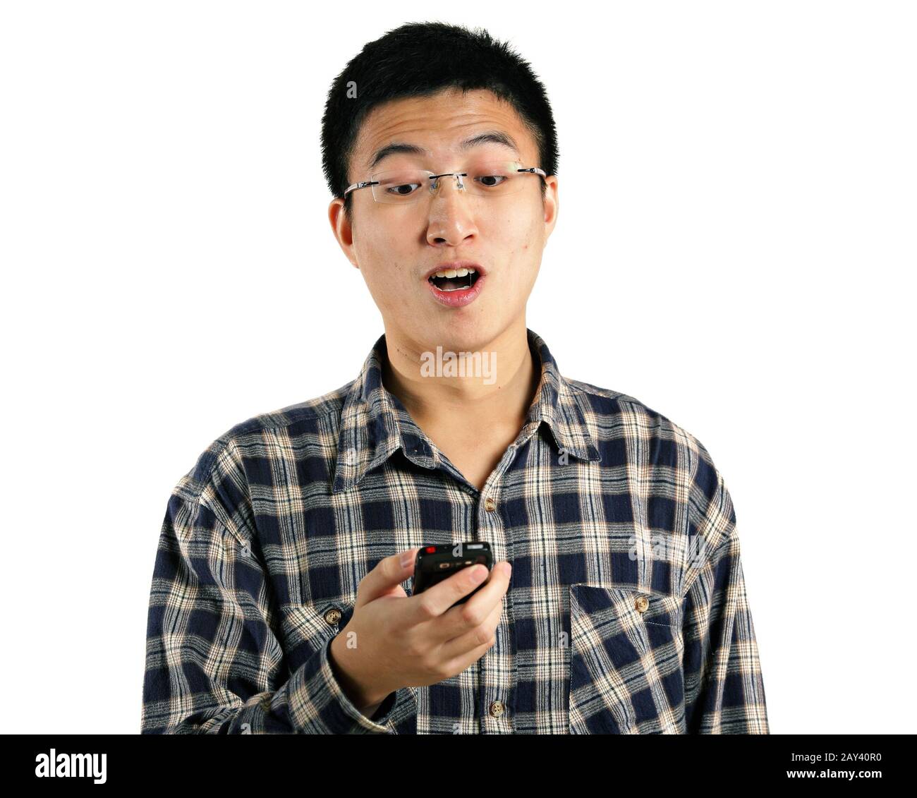 young man surprise by phone Stock Photo