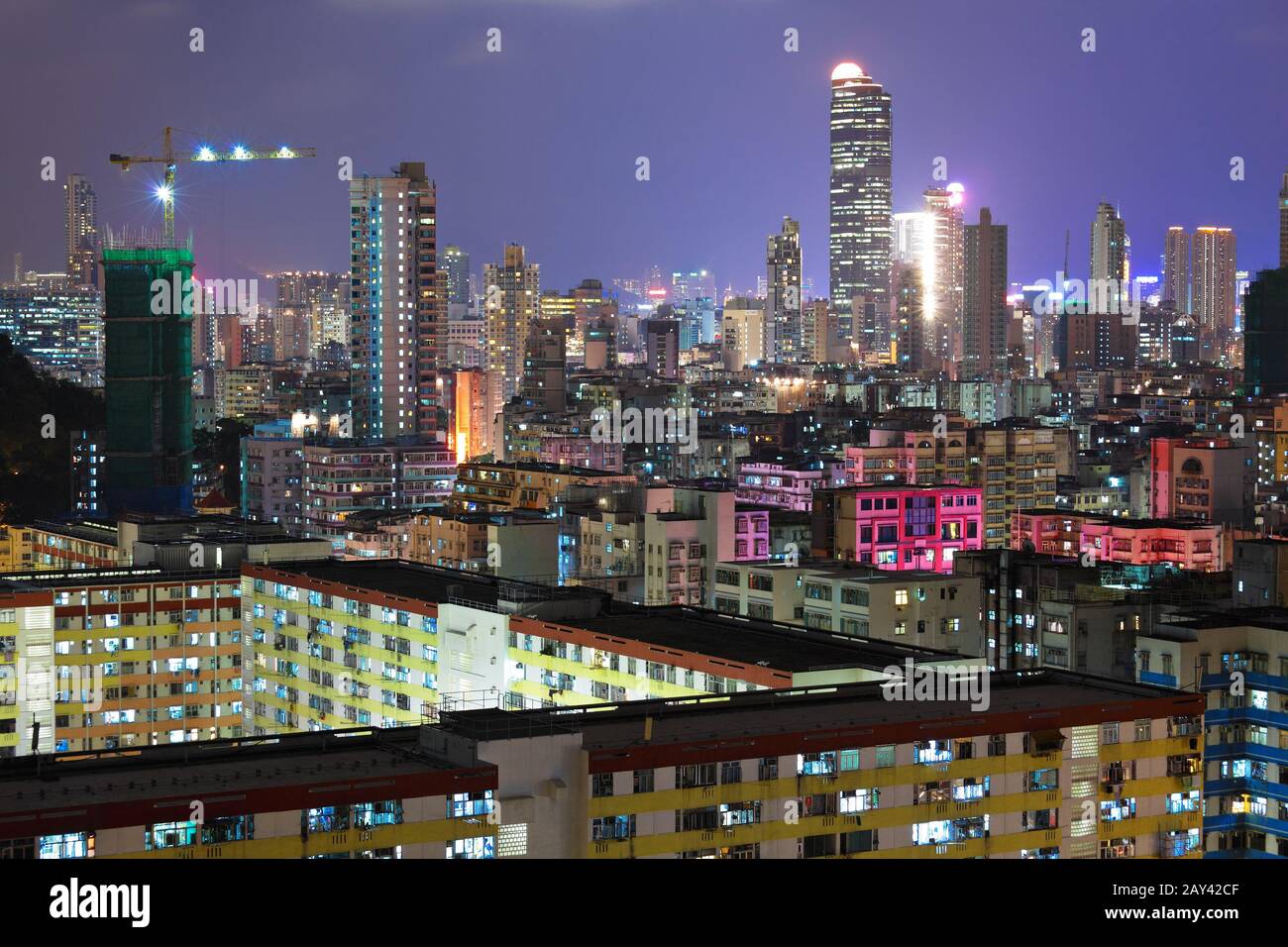 Hong Kong with crowded buildings at night Stock Photo - Alamy