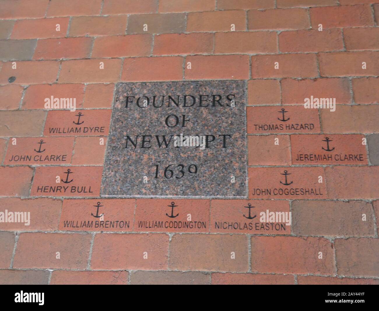 Newport, Rhode Island-September 2017: Names of the founders of Newport in 1639 painted on the brick pavement at the Newport Museum of History. Stock Photo