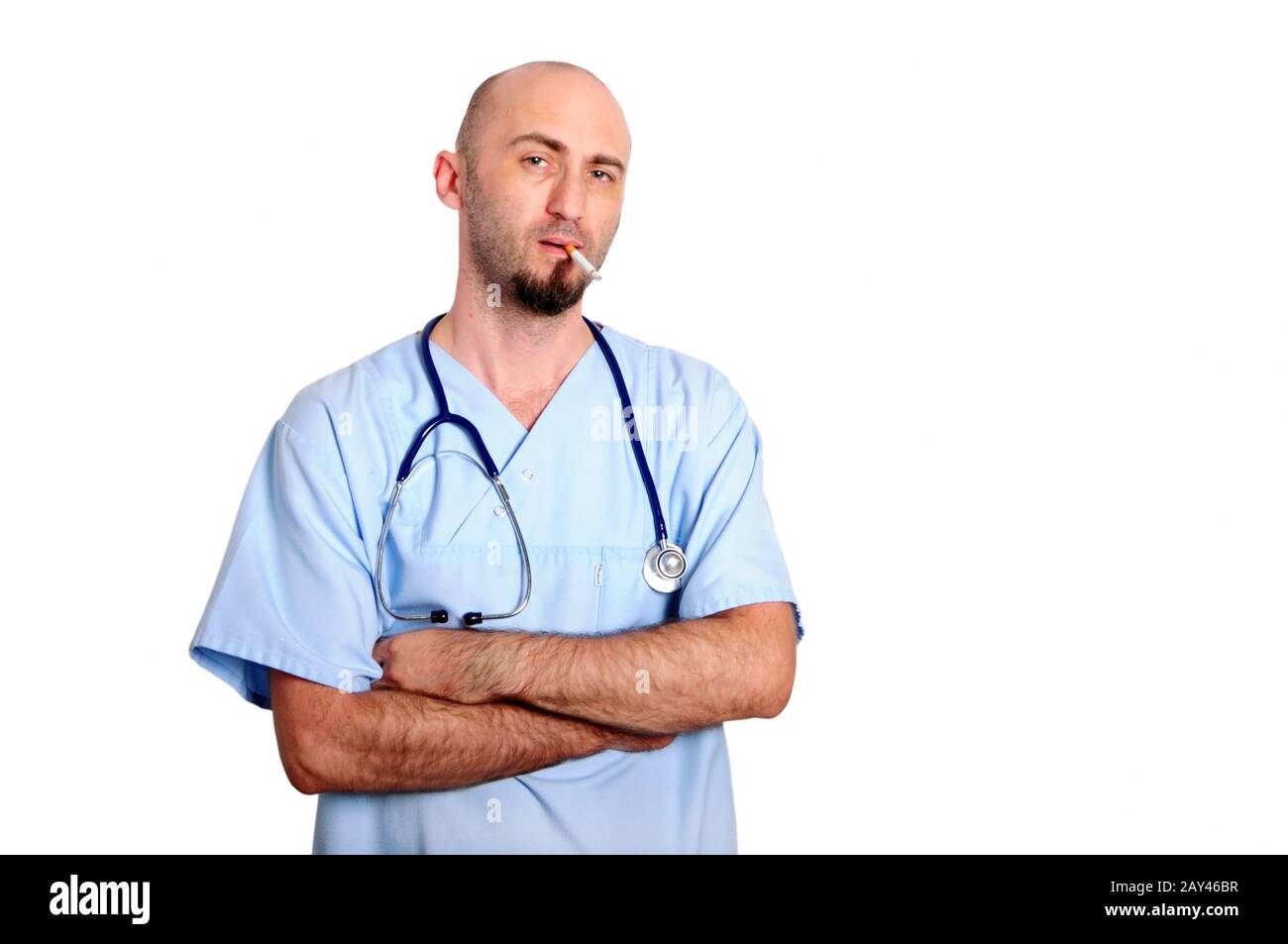 doctor with blue robe over white background smokin Stock Photo - Alamy