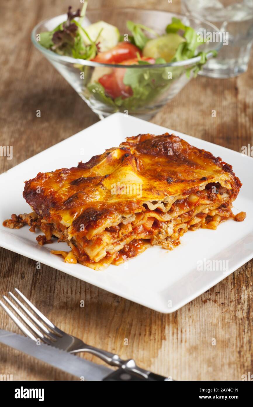 homemade lasagne on rustic wood Stock Photo Alamy