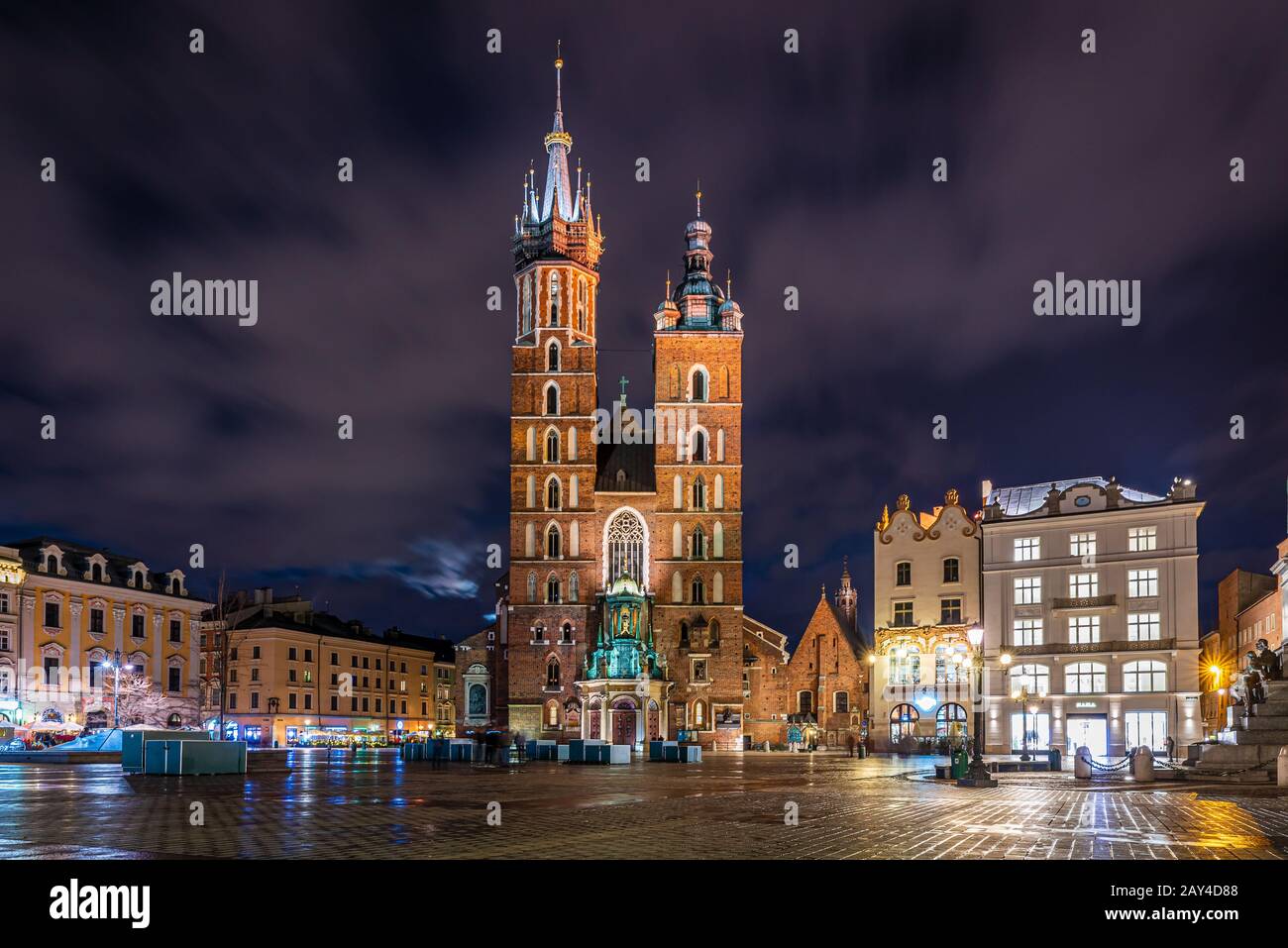 Krakow market square with St Mary's Basilica at night, Krakow, Poland Stock Photo