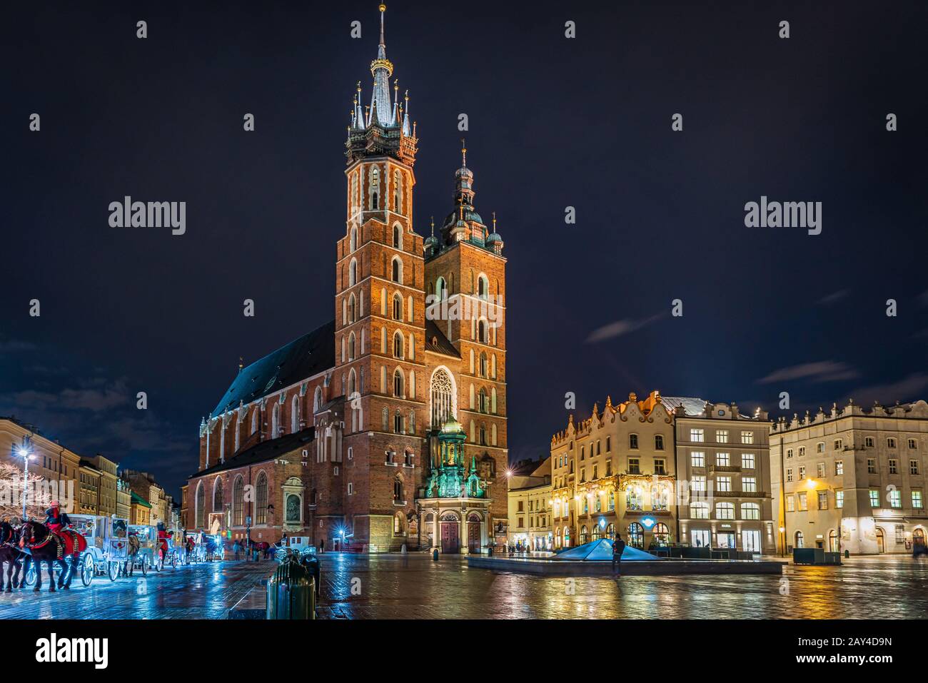 Krakow market square with St Mary's Basilica at night, Krakow, Poland Stock Photo