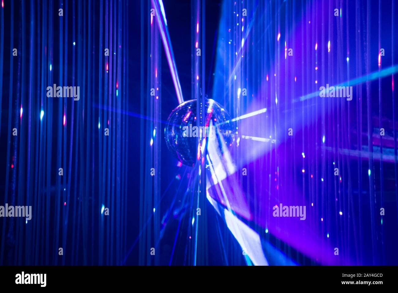 Dance floor disco night with a mirror ball symbol of fun and party in a