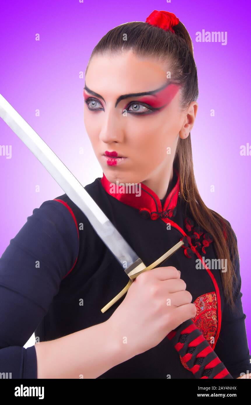 Woman in japanese martial art concept Stock Photo Alamy