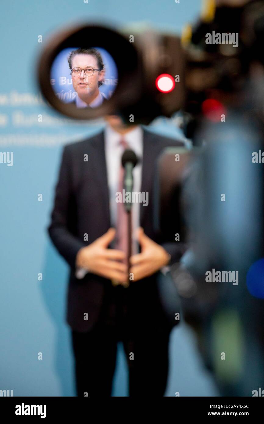 Berlin, Germany. 14th Feb, 2020. Andreas Scheuer (CSU), Federal Minister of Transport, speaks at a press conference on the topics of speed limits and drones in Berlin and can be seen in the viewfinder of a TV camera. Credit: Christoph Soeder/dpa/Alamy Live News Stock Photo
