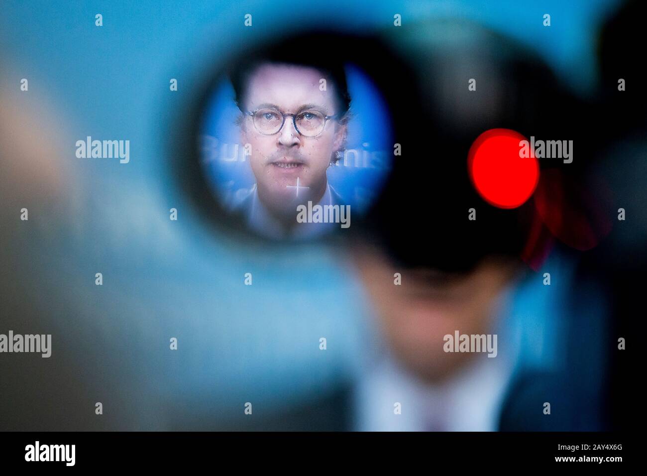 Berlin, Germany. 14th Feb, 2020. Andreas Scheuer (CSU), Federal Minister of Transport, speaks at a press conference on the topics of speed limits and drones in Berlin and can be seen in the viewfinder of a TV camera. Credit: Christoph Soeder/dpa/Alamy Live News Stock Photo