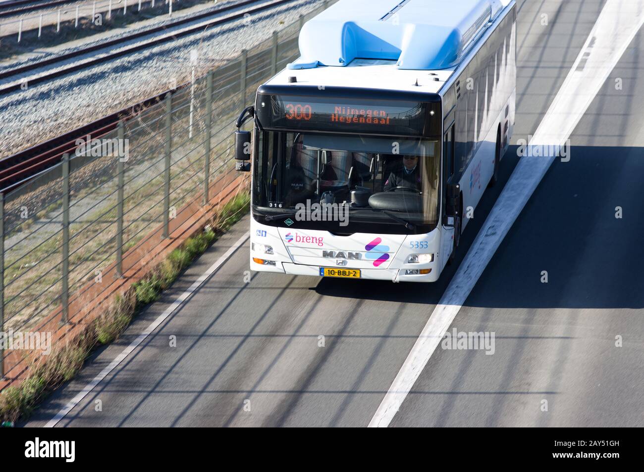 Nijmegen, Netherlands - February 7, 2020: Public transport bus on the road in the center of Nijmegen Stock Photo