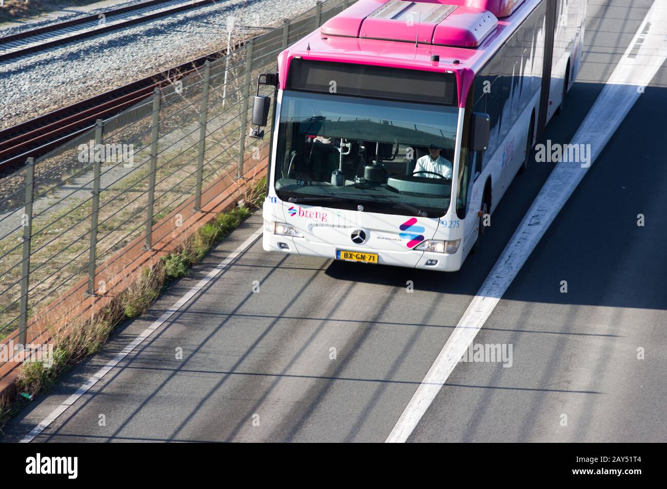 Nijmegen, Netherlands - February 7, 2020: Public transport bus on the road in the center of Nijmegen Stock Photo