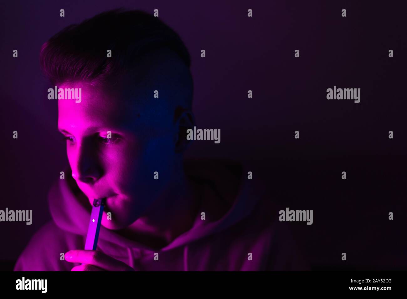 Premium Photo  Vape man exhales a cloud of steam neon light