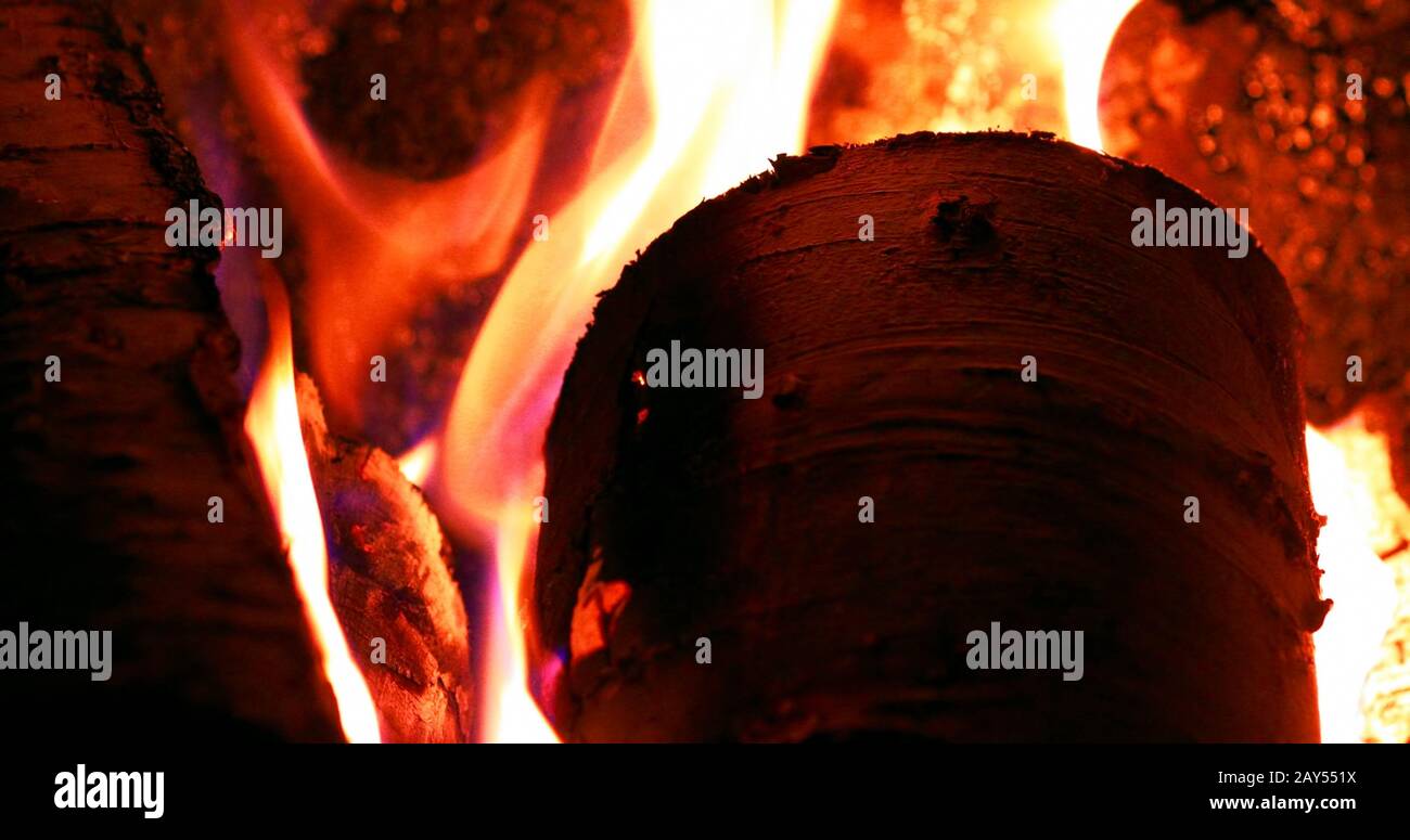 Fire On Burning Firewood Close Up In Hearths Can Be Used As