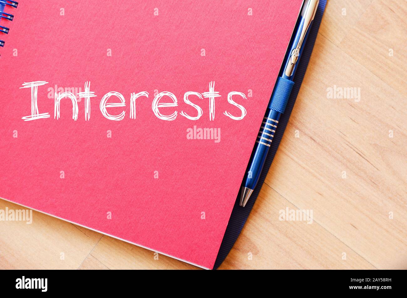 Interests write on notebook Stock Photo