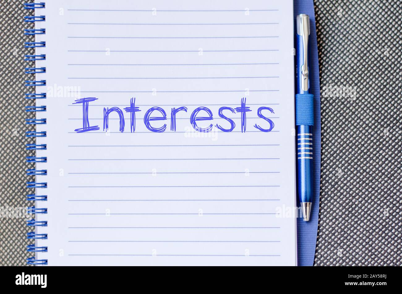 Interests write on notebook Stock Photo