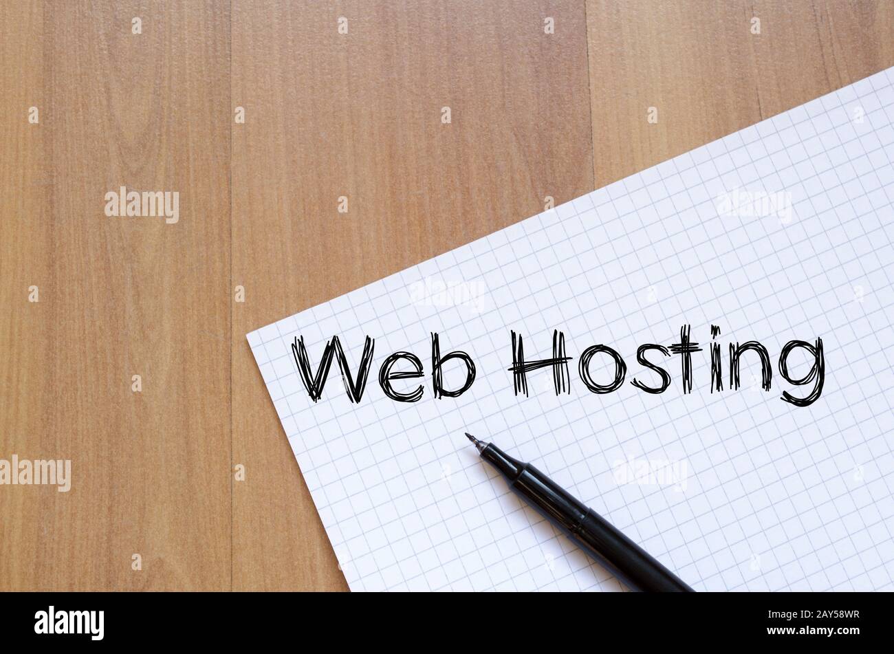 Web hosting write on notebook Stock Photo
