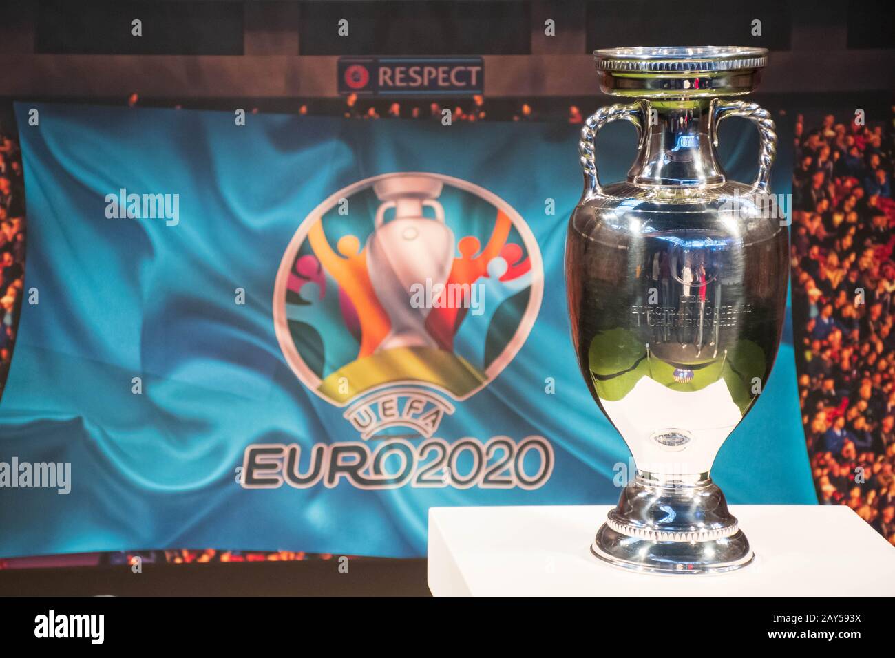 Original UEFA European Championship Trophy with stadium background and logo EURO 2020 Stock Photo