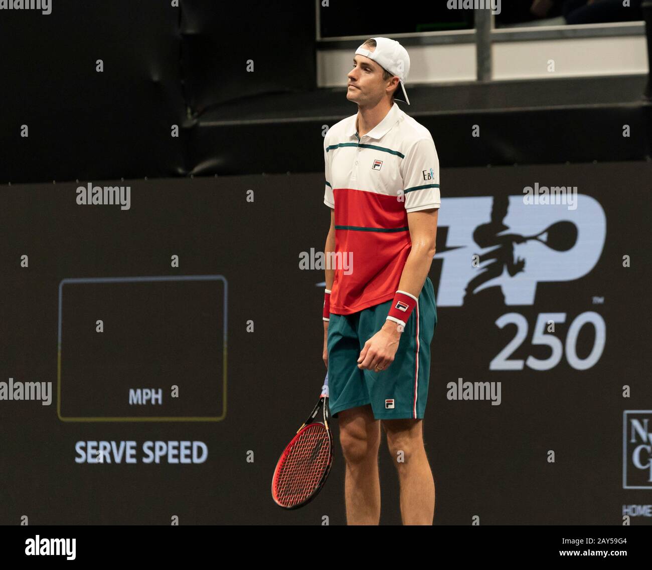 Hempstead, NY - February 13, 2020: John Isner of USA reacts during 2nd  round match against Jordan