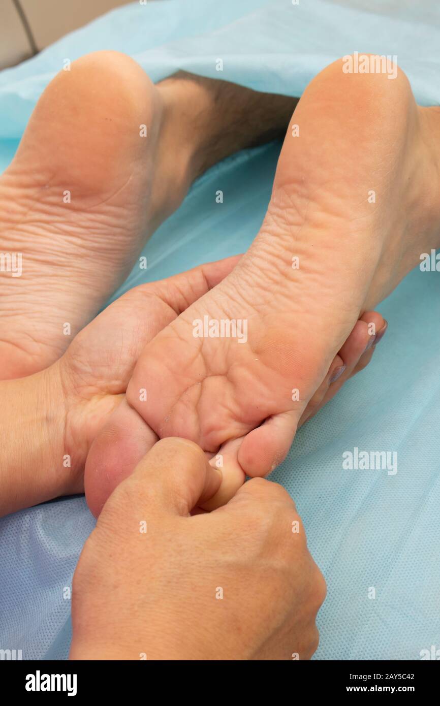 Foot Magic reflexology foot massage, spa foot treatment, thai therapy Stock Photo ...