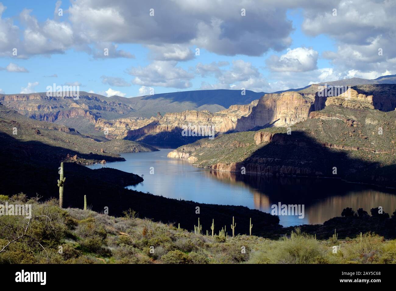 Apache Lake is one of four reservoirs along the Salt River in central Arizona located about 65 miles northeast of Phoenix. Stock Photo