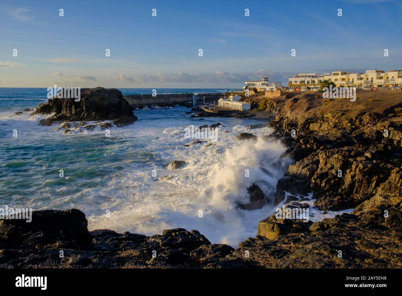Watching the waves El Cotillo La Oliva Fuerteventura  Canary Islands Spain Stock Photo