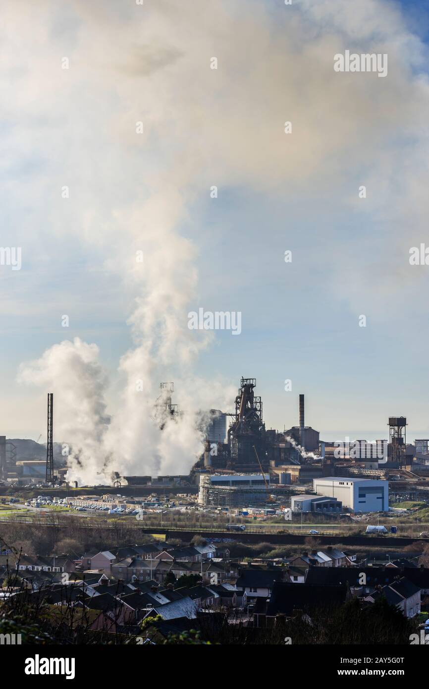 Port Talbot Steel Works emitting clouds of steam Port Talbot Swansea Glamorgan Wales Stock Photo