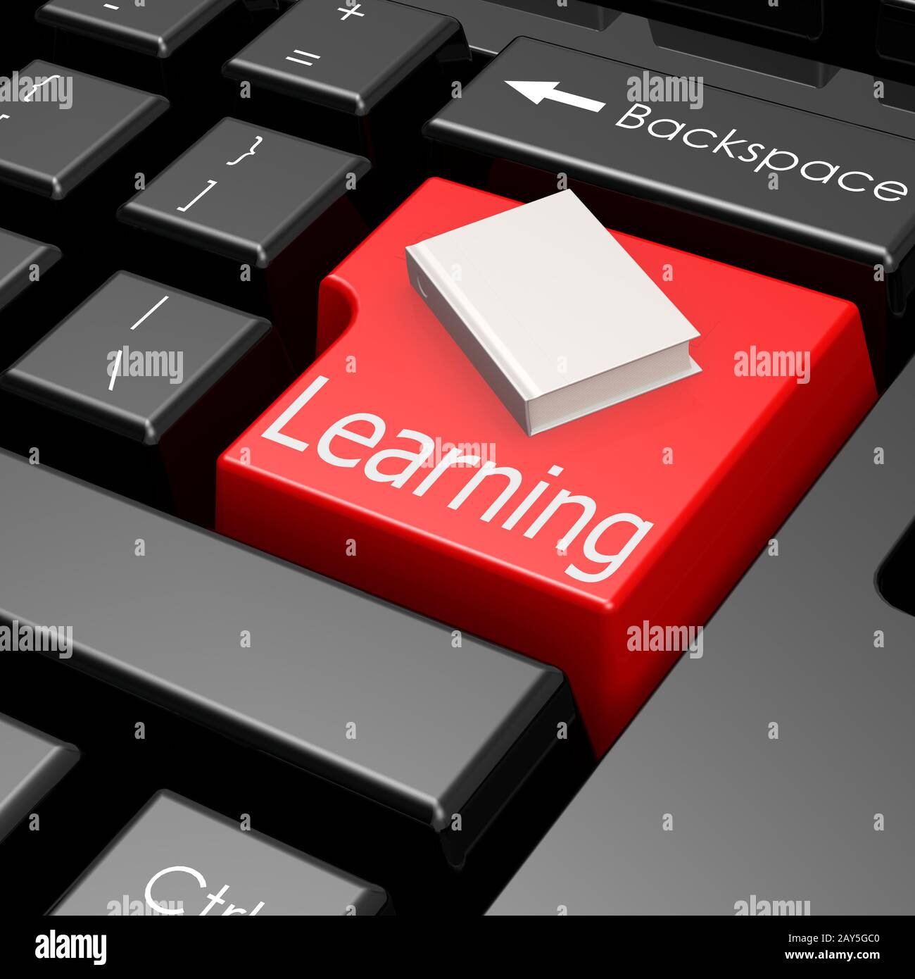 Learning and book on button of computer keyboard Stock Photo - Alamy