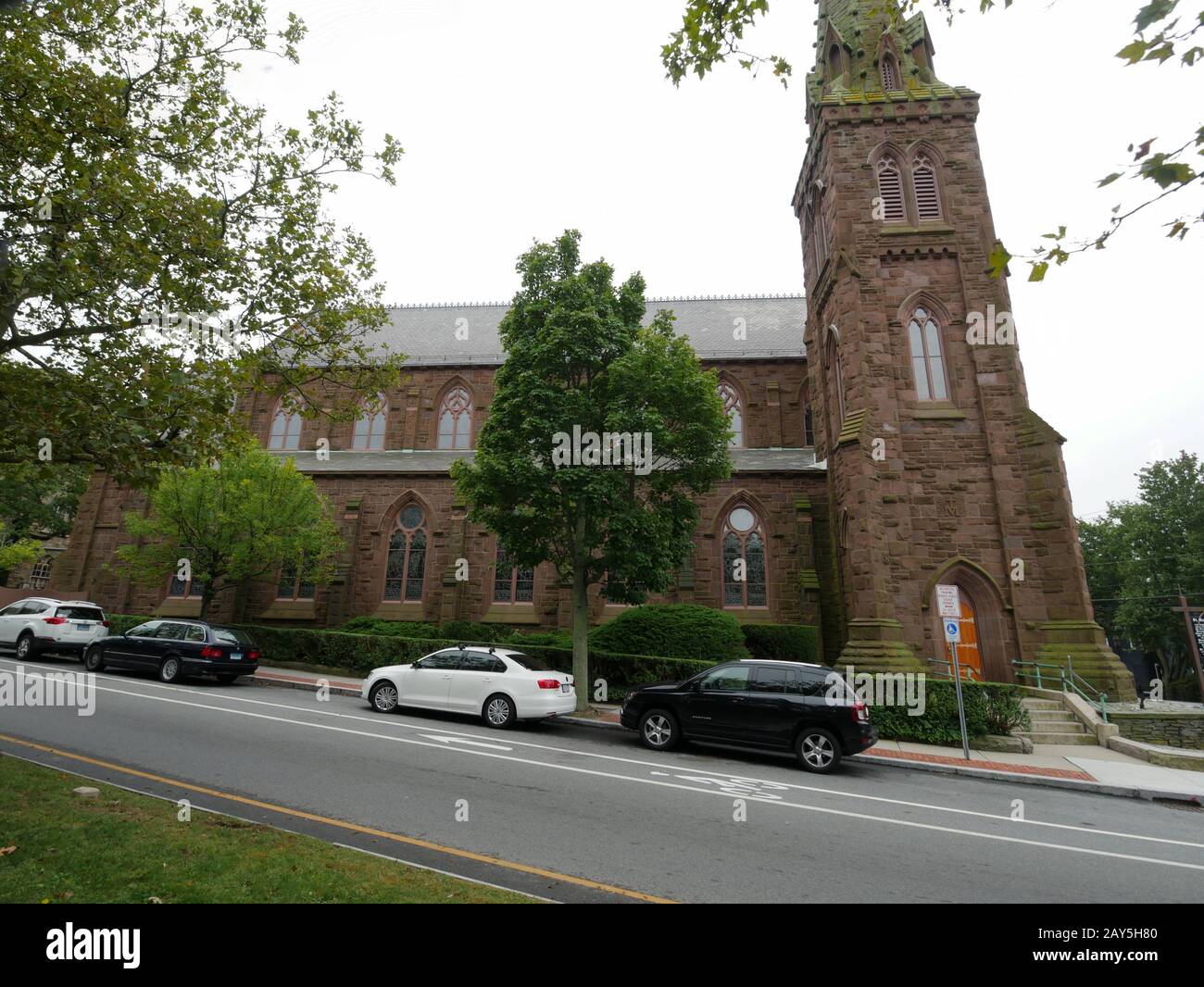 Newport, Rhode Island-September 2017: Historic St. Mary's Church in Newport, with cars parked on the curb. Stock Photo