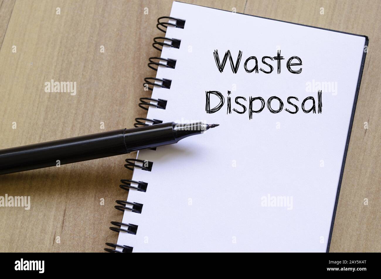 Waste disposal write on notebook Stock Photo Alamy