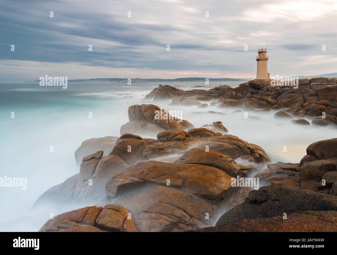 Long exposure at Muxia lighthouse, Muxia,A Coruna, Galcia, Spain, Iberian Peninsula, Western Europe Stock Photo