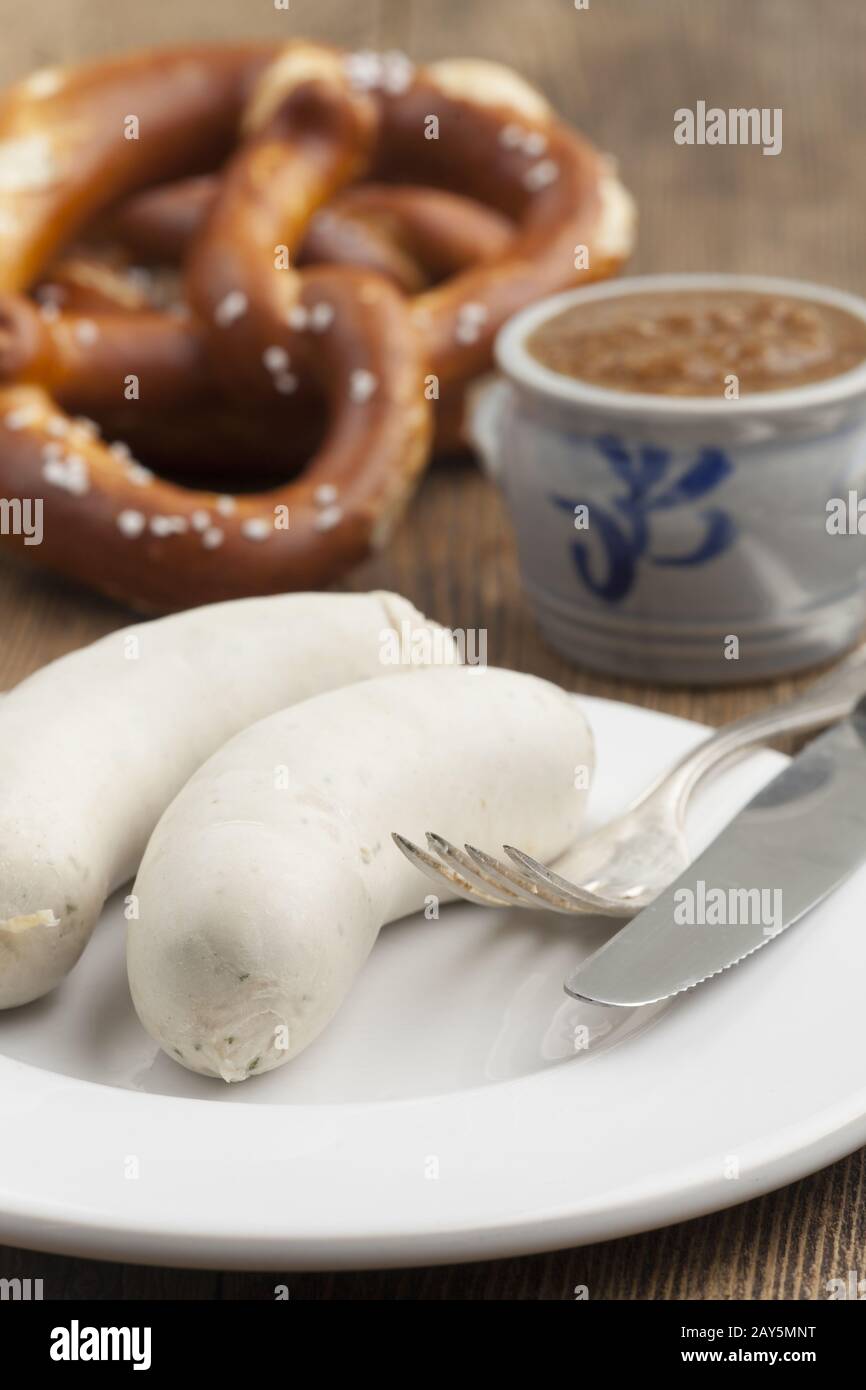 Bavarian veal sausage with pretzel Stock Photo Alamy