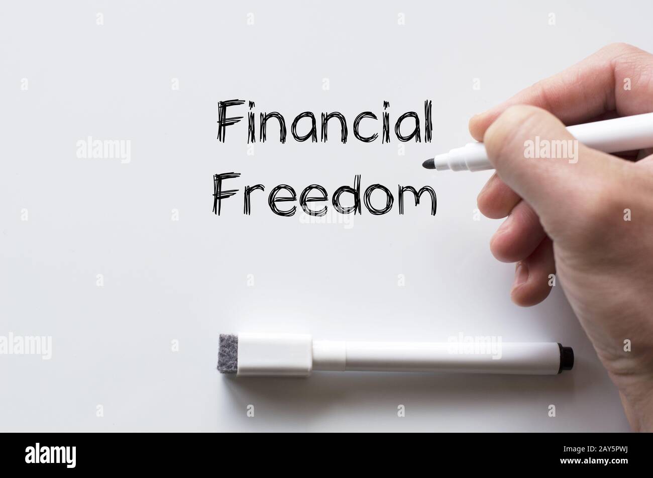 Financial freedom written on whiteboard Stock Photo - Alamy