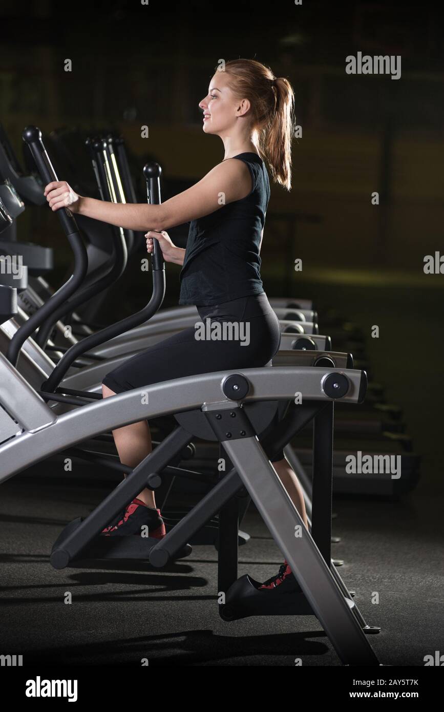 Person on running machine hi-res stock photography and images - Alamy