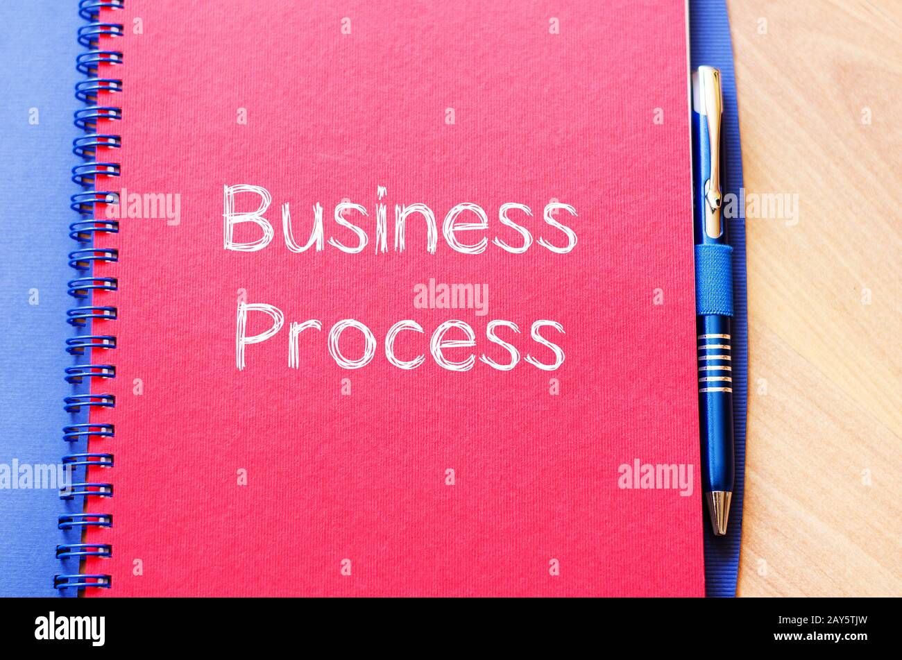 Business process write on notebook Stock Photo