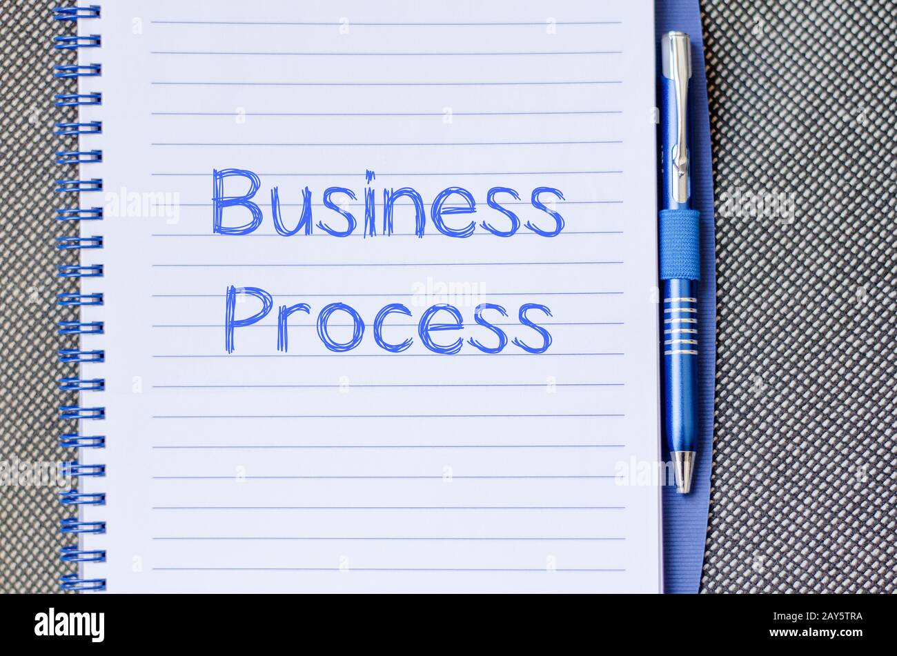 Business process write on notebook Stock Photo