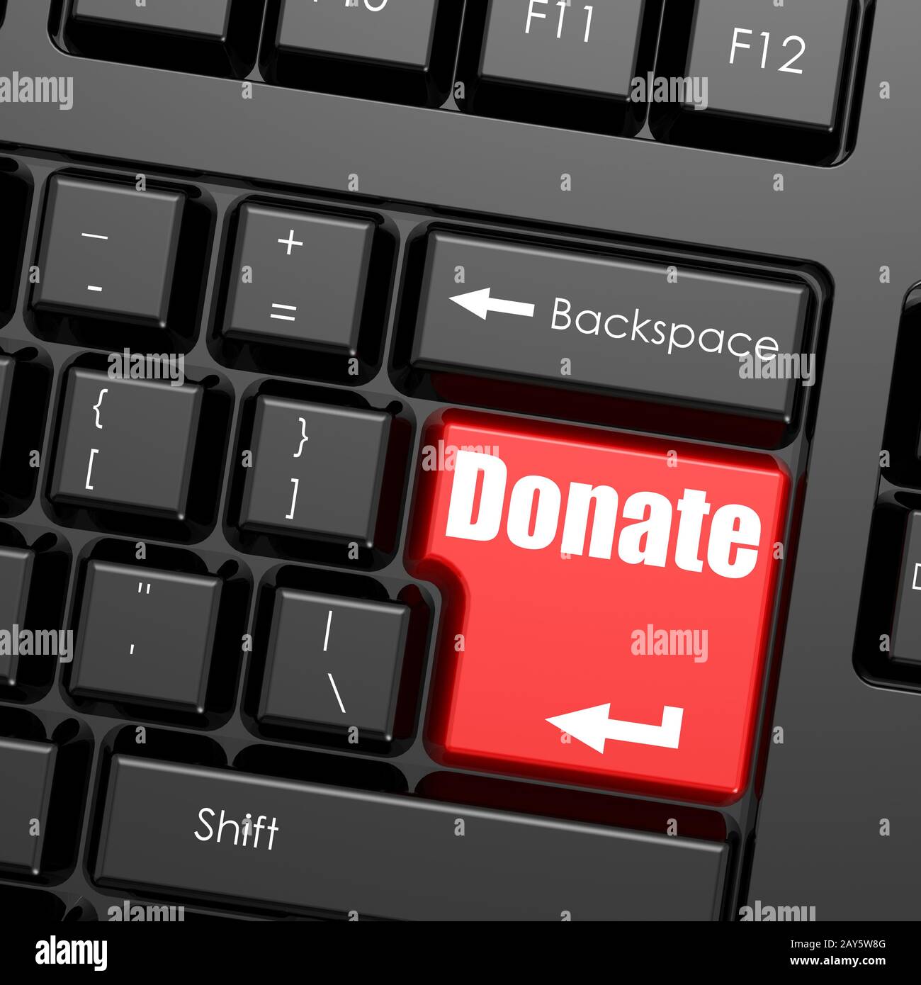 Red enter button on computer keyboard, Donate word Stock Photo