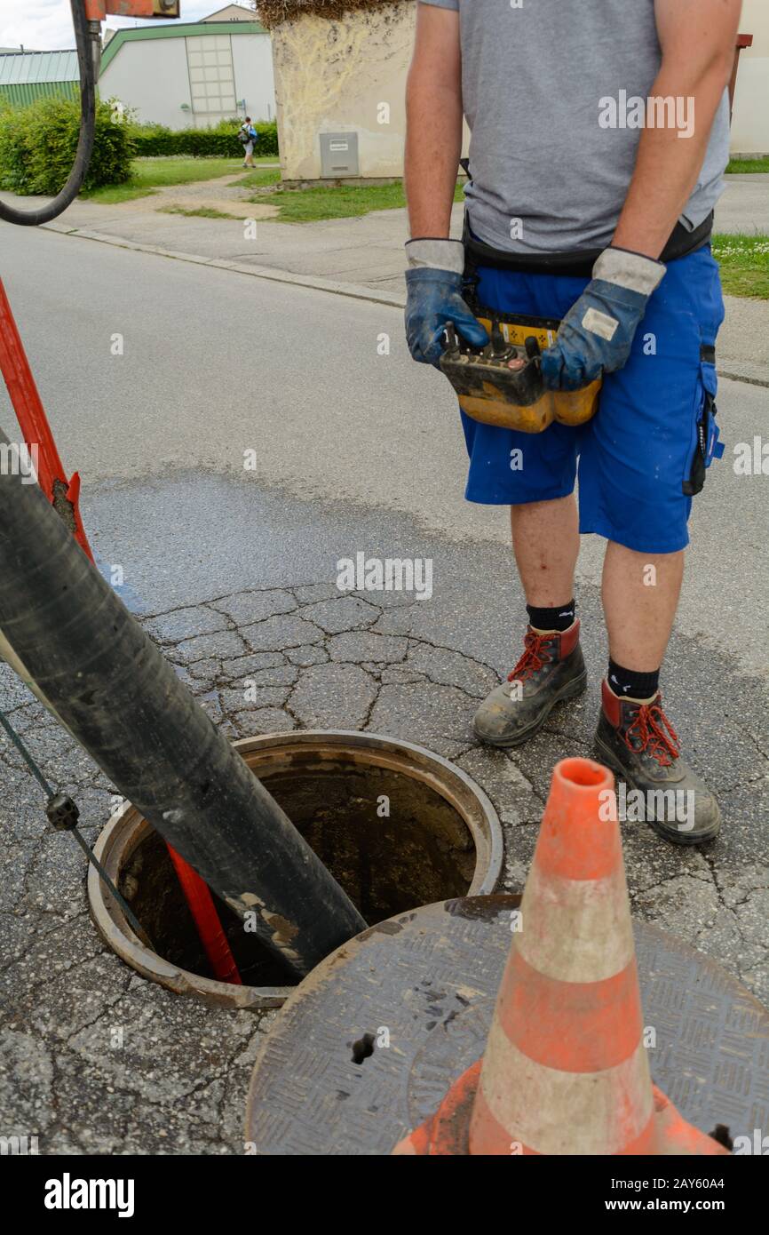 Caucasian Plumber Worker Wearing Safety Gloves Adjusting Water Sewage  Residential Stock Photo by ©welcomia 415928518