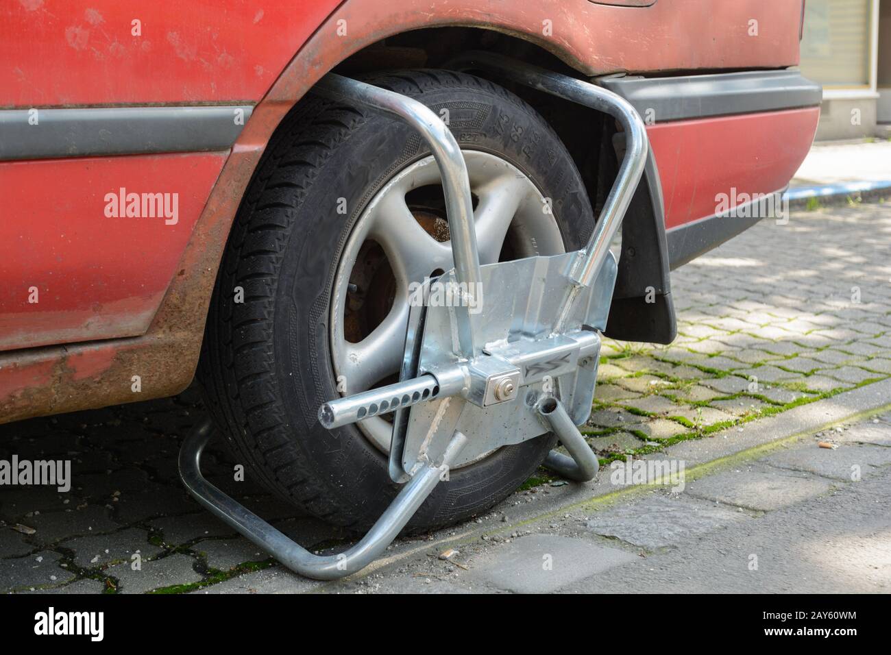Wheel claw - theft protection or means against traffic offenders Stock Photo