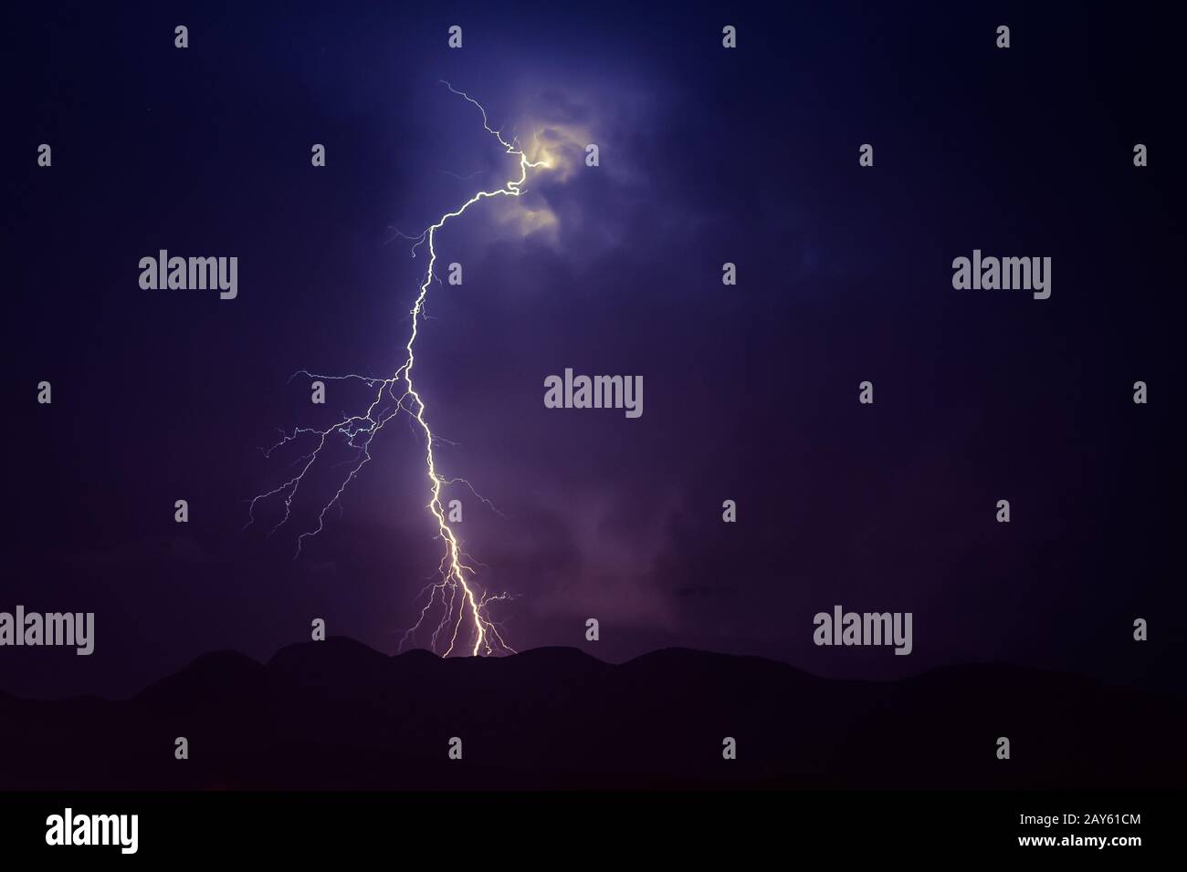 Powerful Lightning Storm Above Mountains Stock Photo