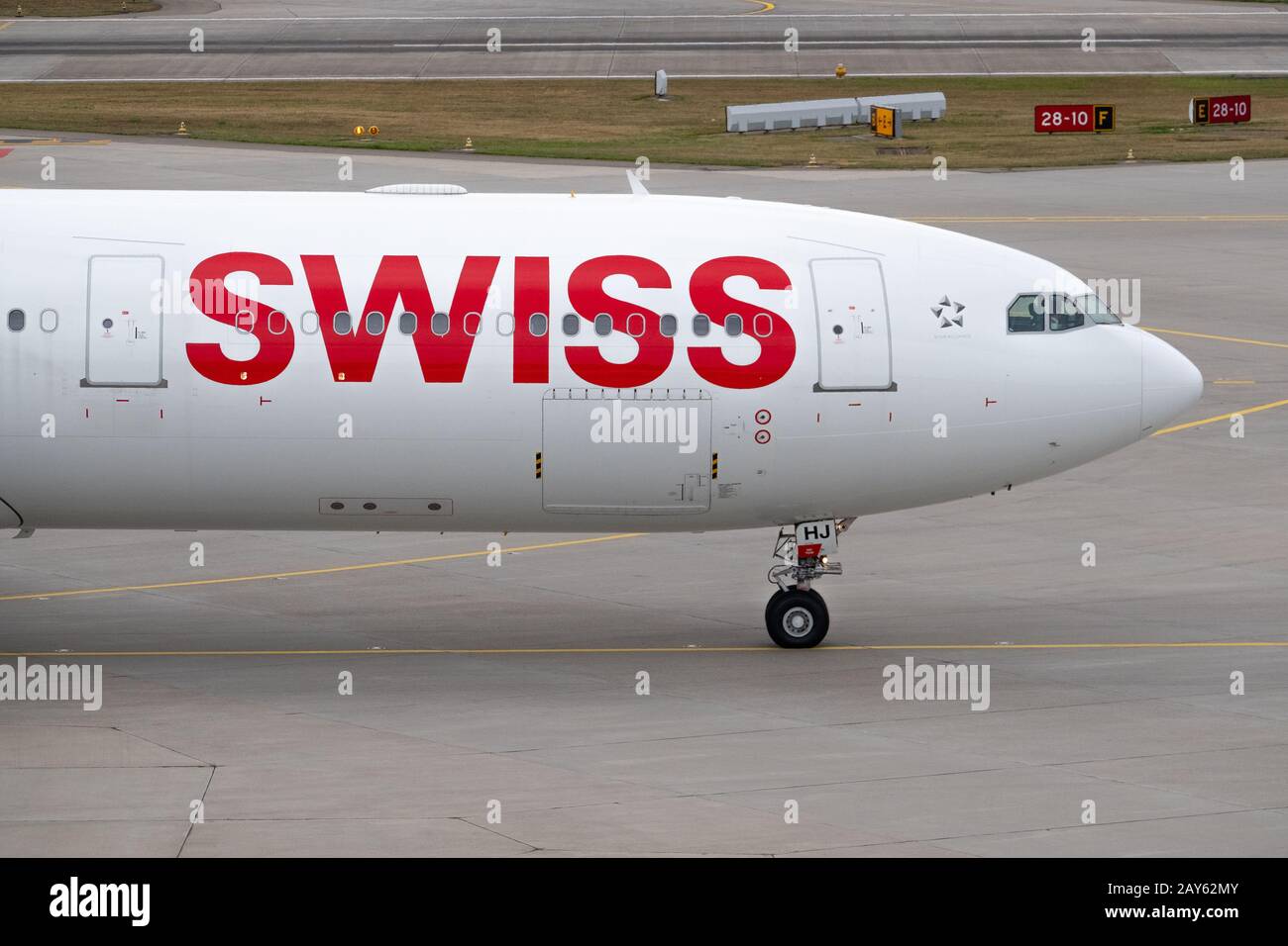 Swiss airlines airplanes preparing for take-off at day time in ...