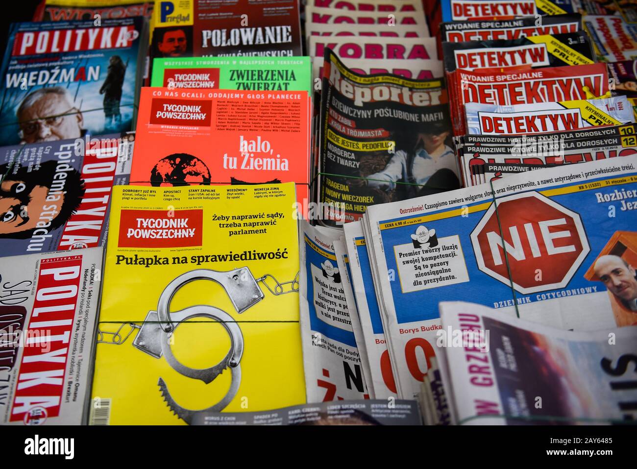 Weekly Polish news magazines for sale at the market.Nowy Klepasz is one of the many outdoor markets, where food products, clothes, groceries among other things are bought from micro traders. Stock Photo