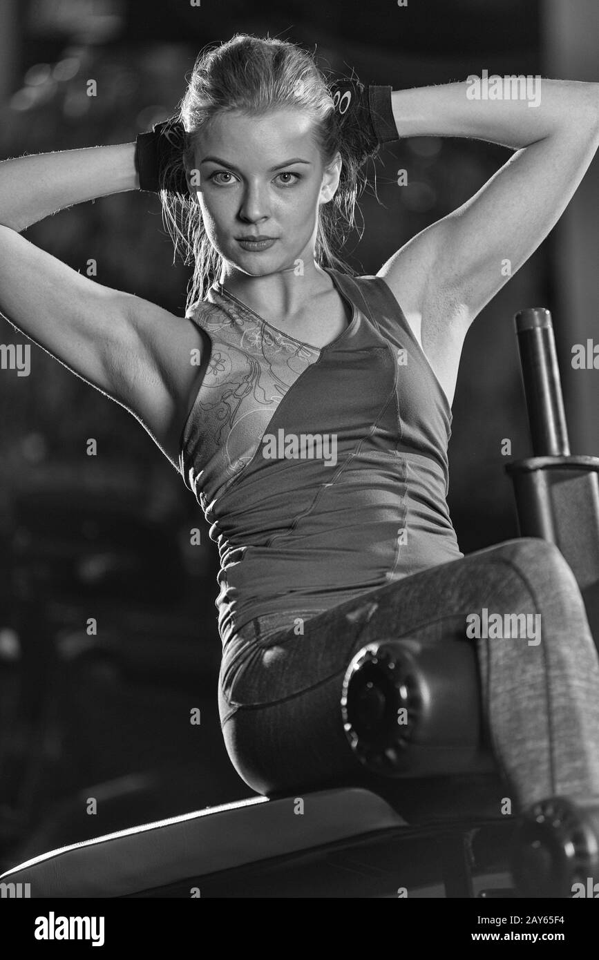 Woman doing strength exercises for abs muscles Stock Photo Alamy