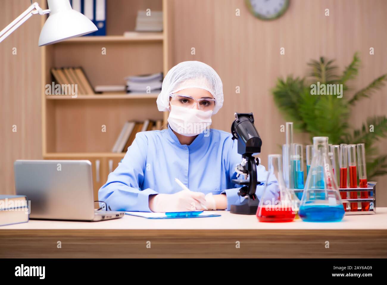 Lab chemist working with microscope and tubes Stock Photo Alamy Lab chemist working with microscope and tubes Stock Photo Alamy
